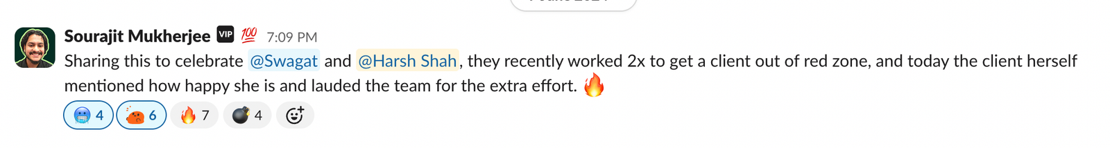 Slack message celebrating a team that pulled a client out of red zone.